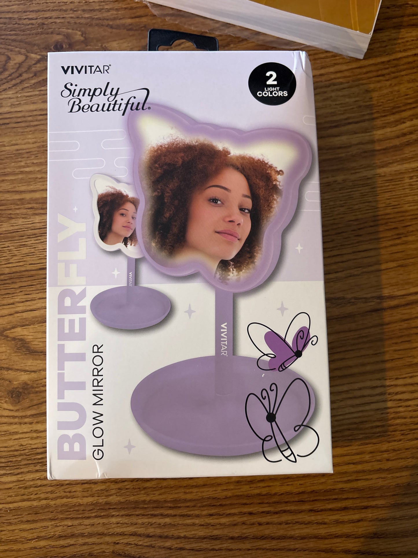 Butterfly glow mirror with two light colors