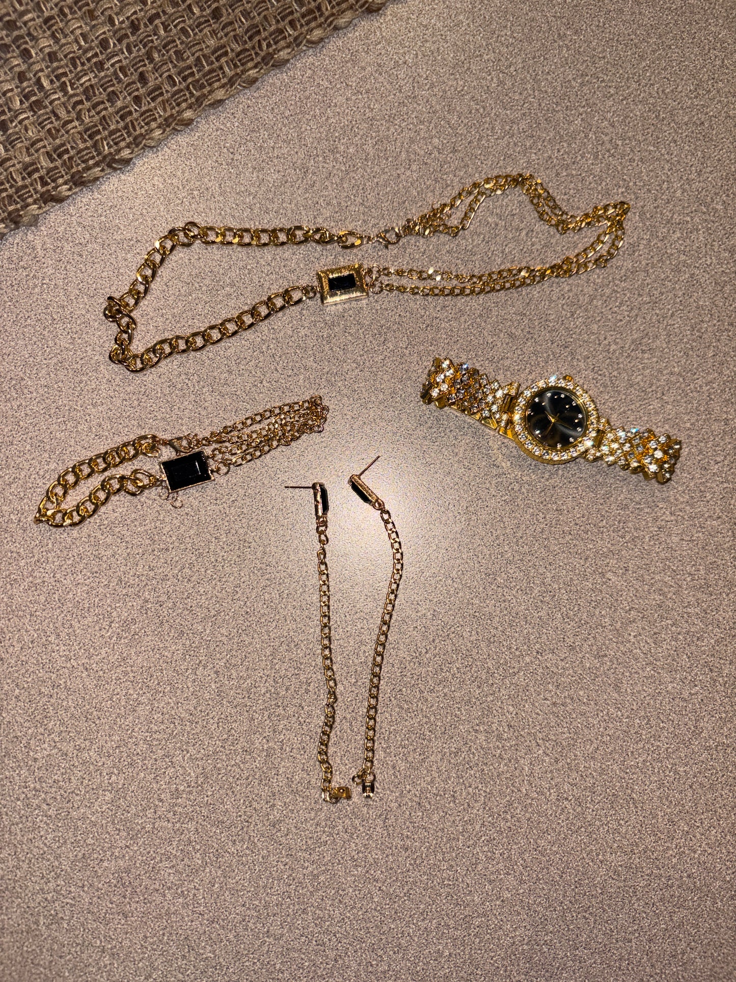 Costume, jewelry earrings, watch bracelet, and necklace