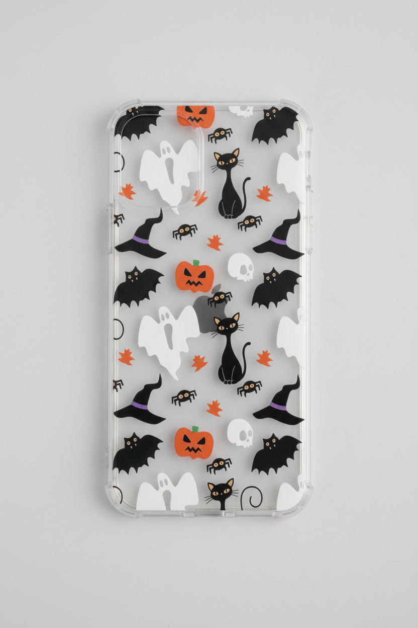 Phone case with Halloween-themed design featuring cats, pumpkins, and witches' hats on a beige background.