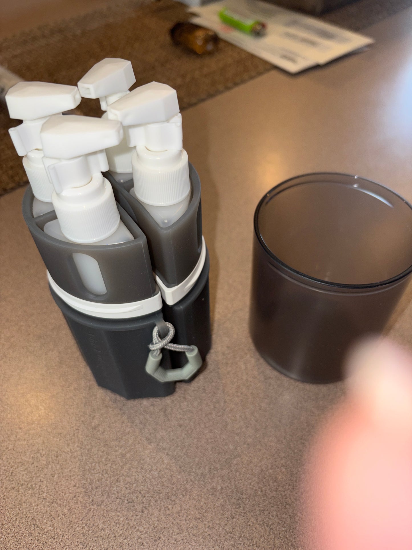 Four and one dispenser with suction cup